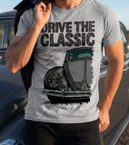Drive The Classic VW Type 1 Beetle Early Model (Oval) . T-shirt in Heather Grey Colour