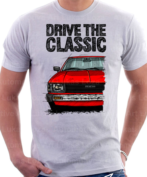 Drive The Classic Toyota Corolla KE70 Square Headlights Chrome Bumper. T-shirt in White Colour