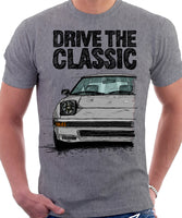 Drive The Classic Mazda RX7 Mk1  Late Model. T-shirt in Heather Grey Colour