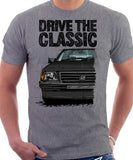 Drive The Classic Vauxhall Nova Early Model. T-shirt in Heather Grey Colour